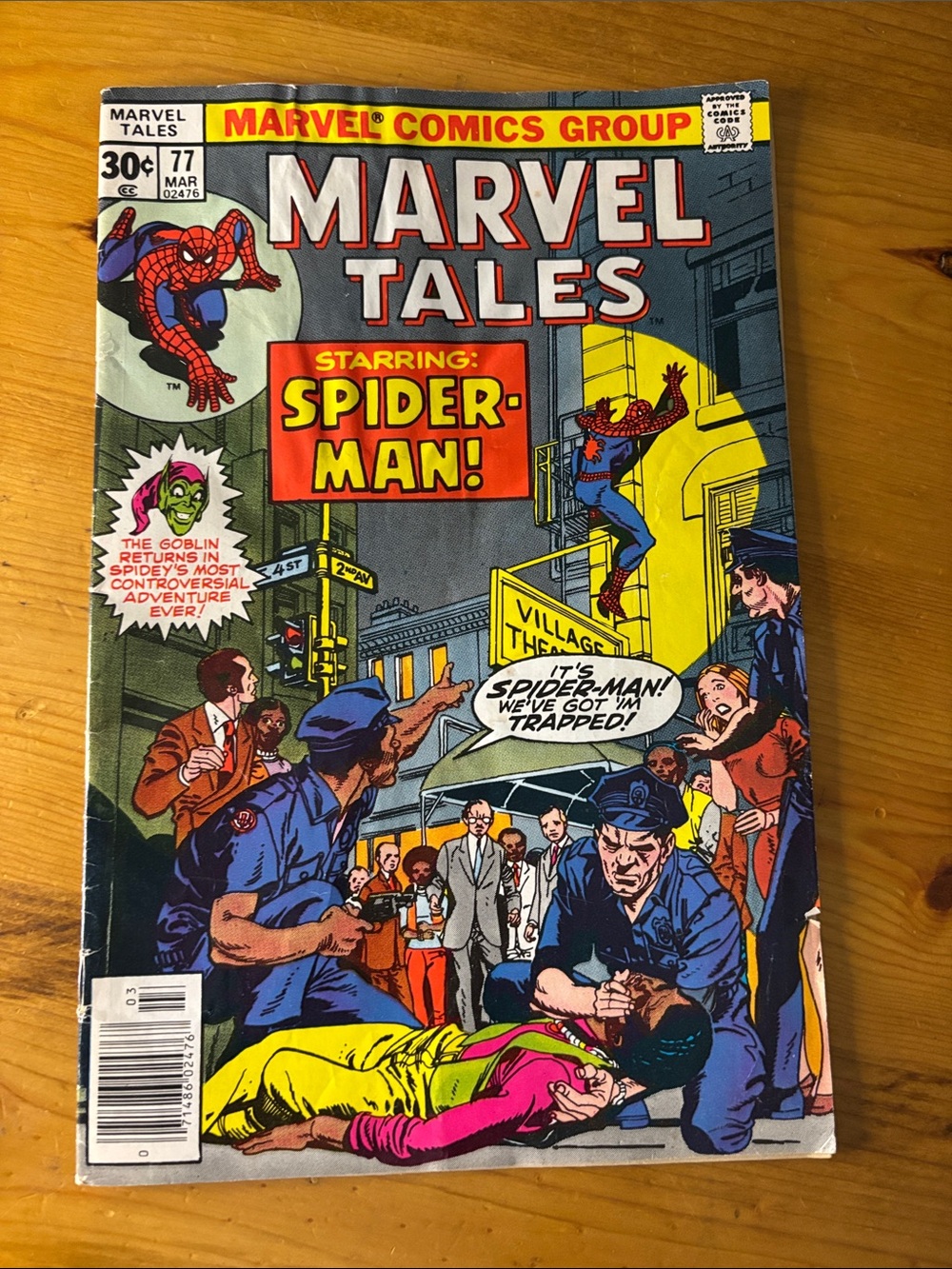 1977 Marvel Spider-Man Comic Cover with Red, Yellow and Blue Artwork